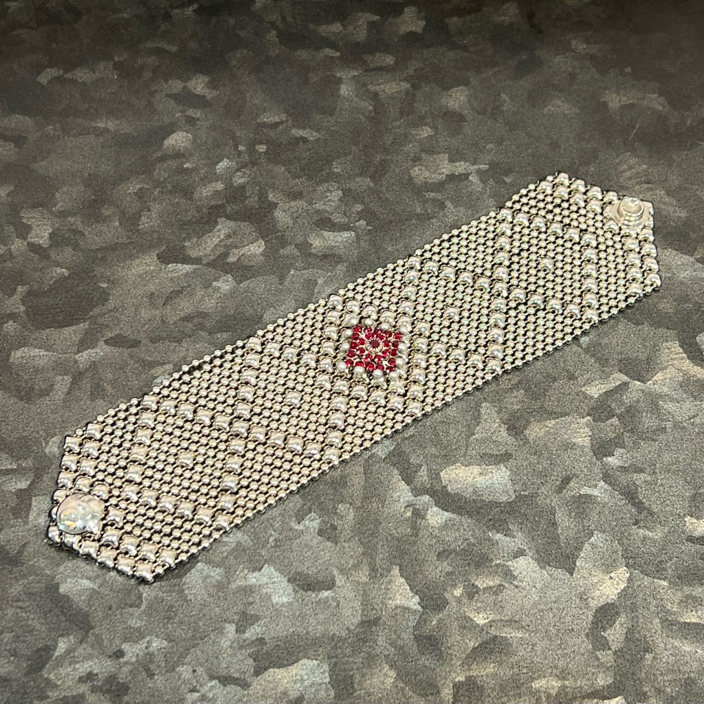 Silver Beaded Bracelet With Red Accent